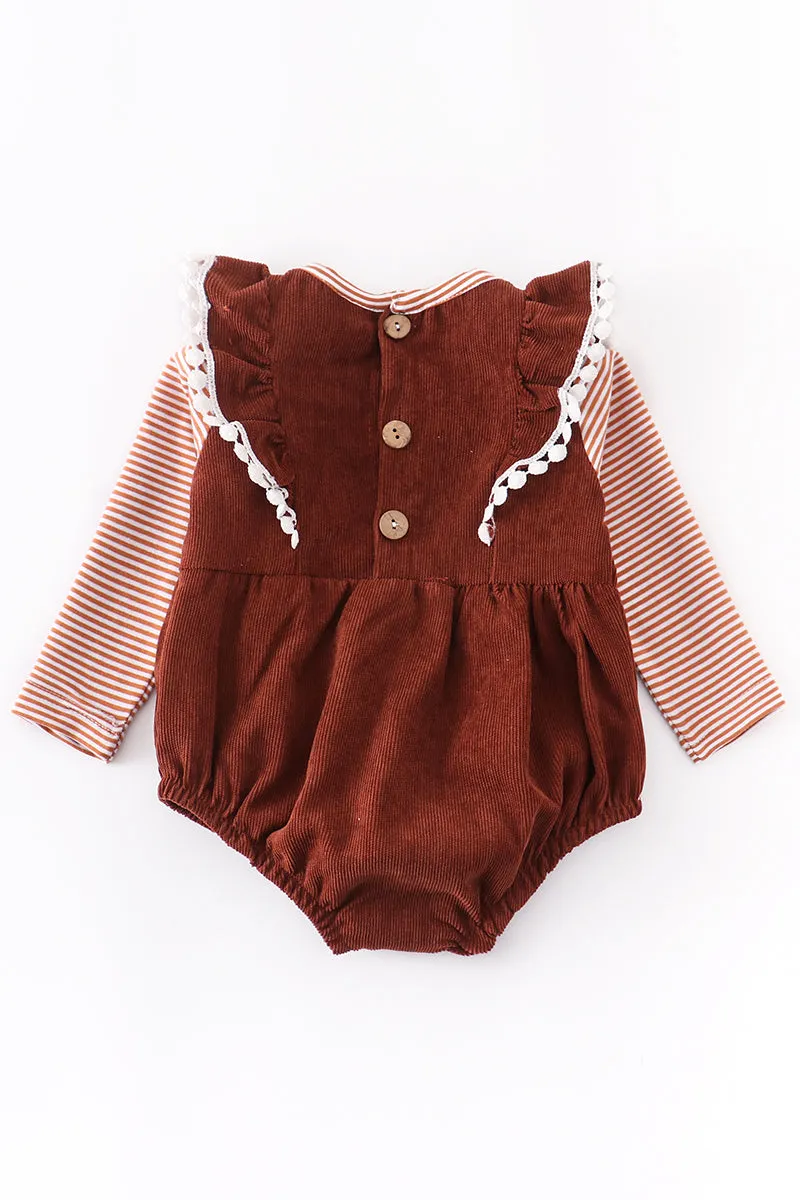 Brown cow truck pom-pom baby onesie